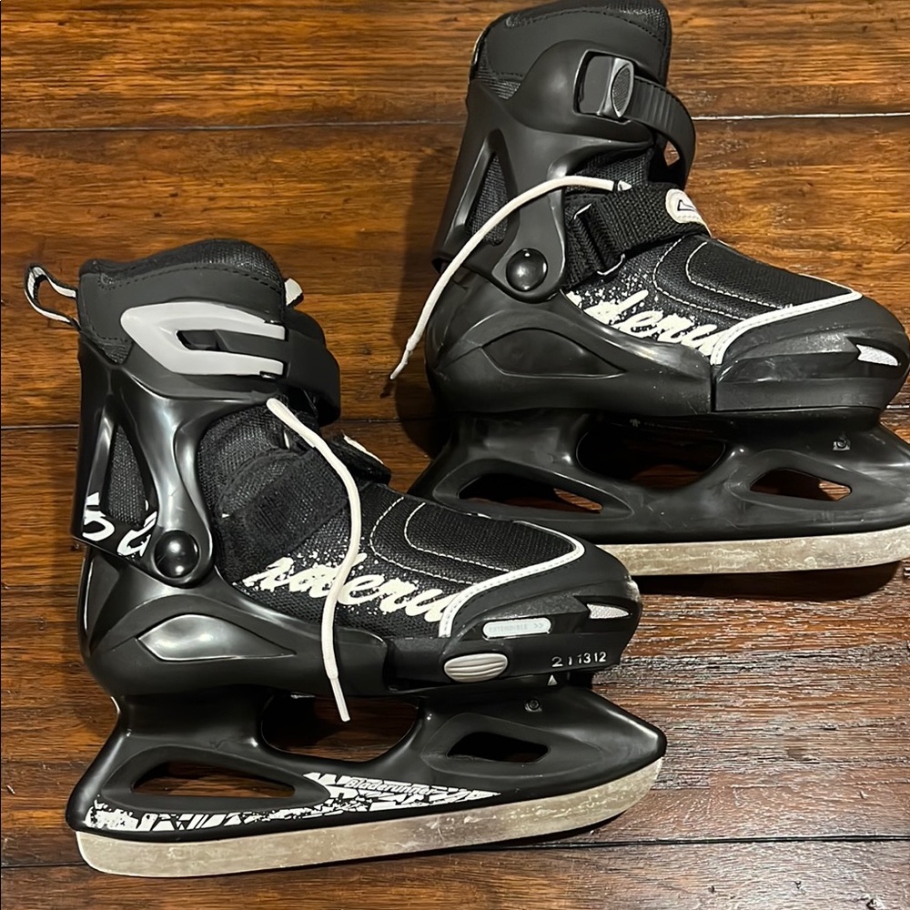 Black and Gray Ice Skates Bladerunner boys size 12J youth , adjustable.